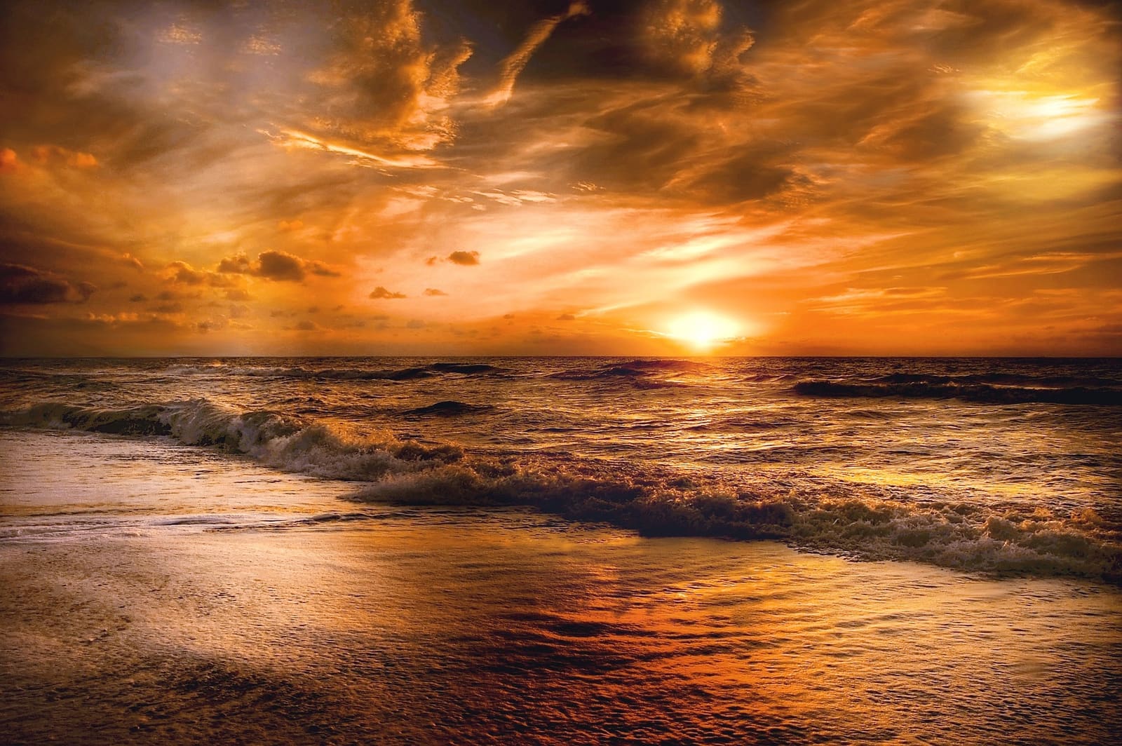 Sunset over a calm beach